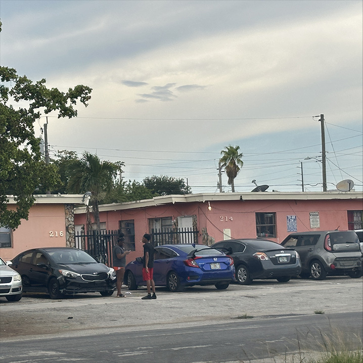 a street with parked cars